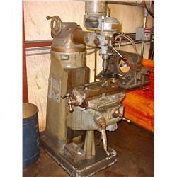 Bridgeport milling machine with cylinder base fixture