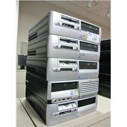 Stack Of 5 Computers