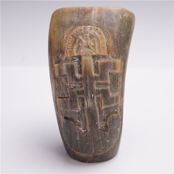 Carved Horn Beaker Depicting Humanoid Figure with Axe Motif Base