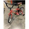 Image 2 : RED MOBELLO KIDS BIKE AND WHITE NAKAMURA KIDS BIKE BOTH WITH TRAINING WHEELS