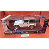 Image 1 : NIB 1:18 scale Jeep Wrangler Sahara die cast