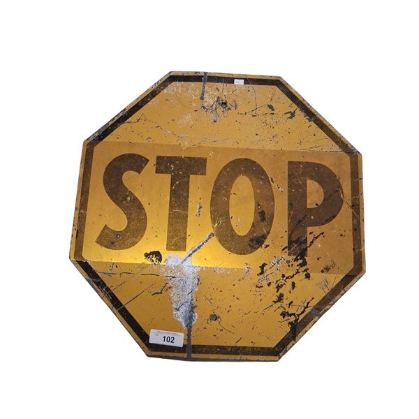 Vintage yellow metal STOP sign 25"