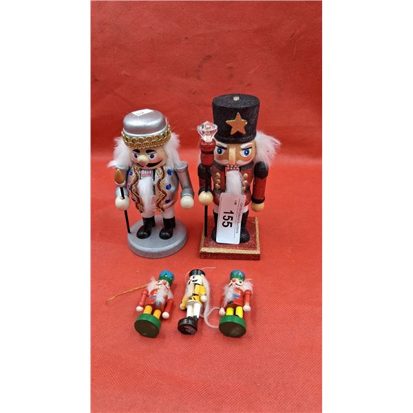 2 wooden nutcrackers plus 2 small nutcrackers, 6" & 2"