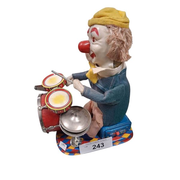 Vintage wind up clown drummer 9"