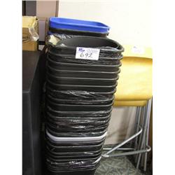 2 Large Stacks Of Garbage Cans