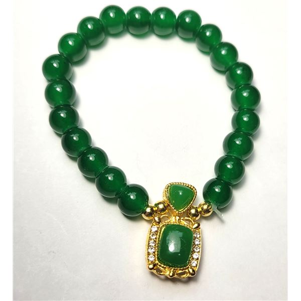 6)  GREEN JADE COLORED BRACELET WITH GOLD