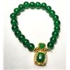 Image 1 : 6)  GREEN JADE COLORED BRACELET WITH GOLD