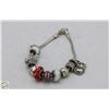 Image 1 : SILVER CHARM BRACELET WITH ASSORTED 925 CHARMS