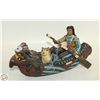 Image 1 : NORTH AMERICAN ABORIGINAL ON CANOE FIGURINE