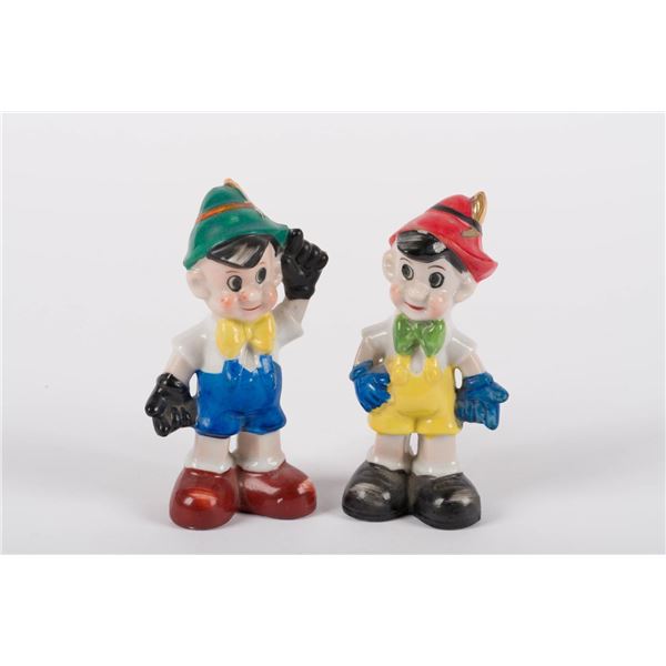 A Pair of Pinocchio Salt and Pepper Shakers.