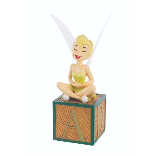 A Tinker Bell Figurine with Light-Up Wings.
