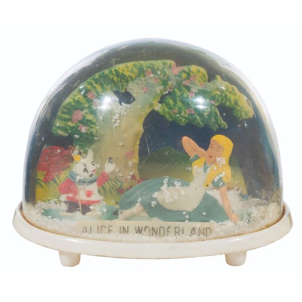 An  Alice in Wonderland  Snow Globe by Marx.