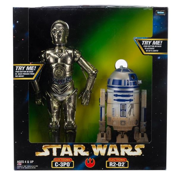 A Kenner Electronic C- 3PO and R2-D2 Figure Set.