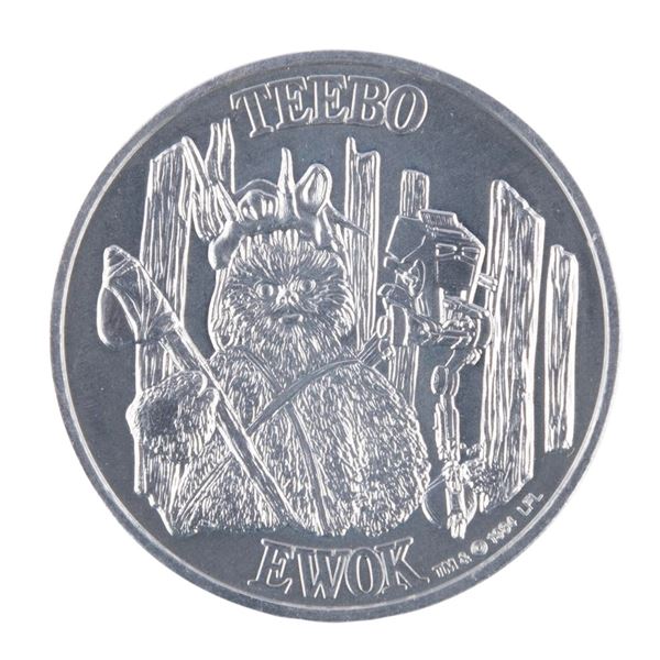 A Teebo Ewok Power of the Force Collector Coin.