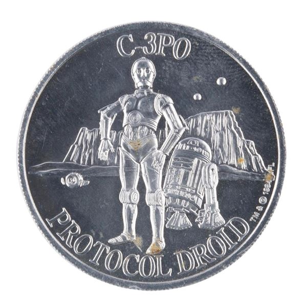 A C-3PO Power of the Force Collector Coin.