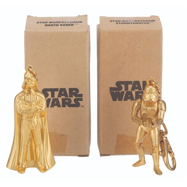 A Pair of Star Wars Darth Vader and Stormtrooper Keychains.