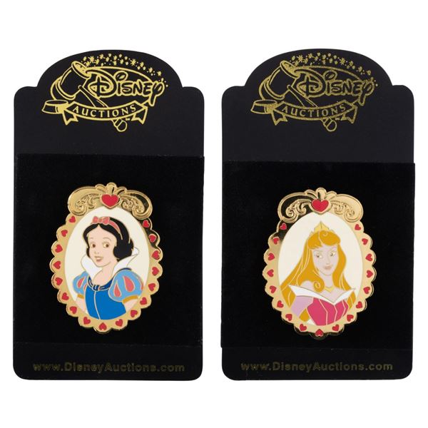 A Pair of Disney Auctions Princess Cameo Pins.
