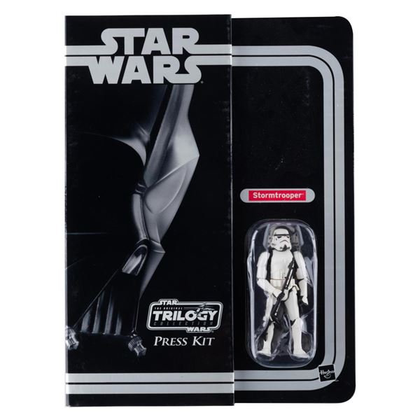 A 2004 Star Wars Toy Fair Press Kit with Stormtrooper Figure.