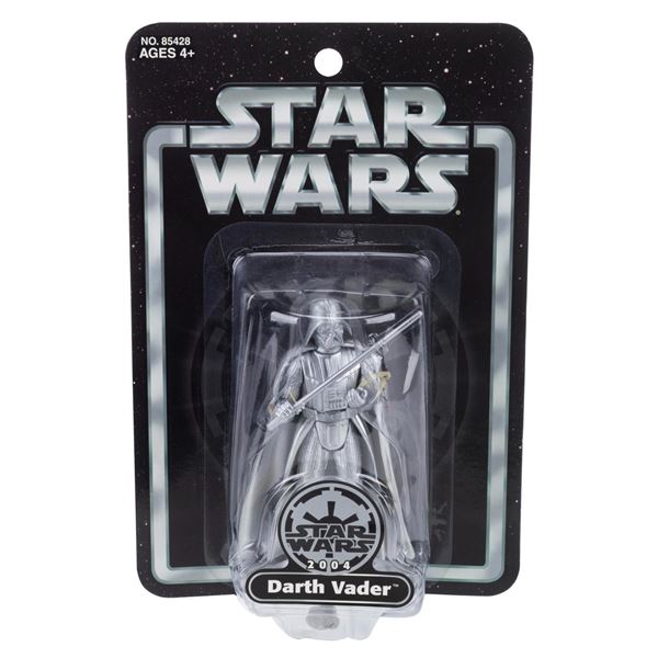A 2004 Silver Darth Vader Figure.