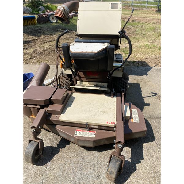 Grasshopper 42 in front mt mower, c/w 16 h.p. vanguard gas motor, rear bagger c/w dump, runs fine