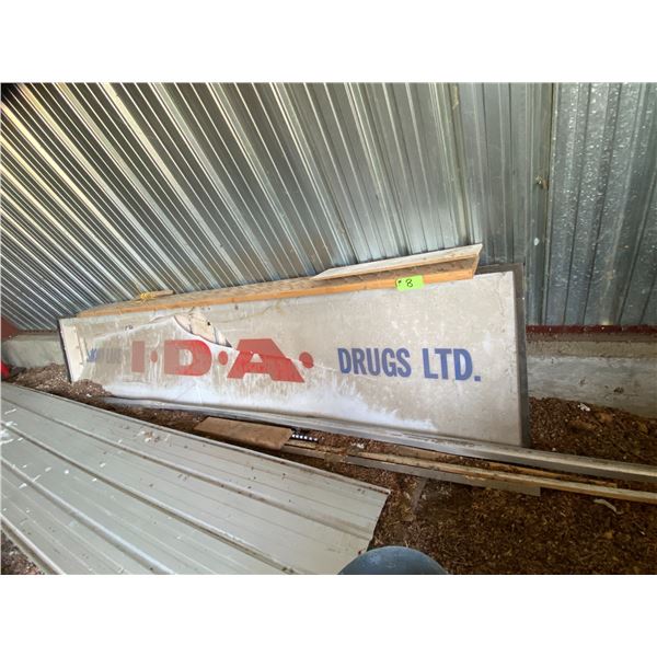 I.D.A. Sign. Damaged & 2 Sheets of Siding