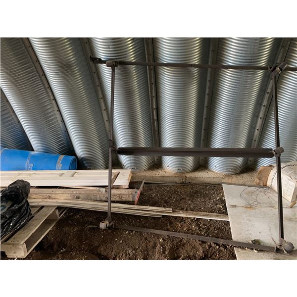 Metal bed frame, old wooden step ladder & misc. wood, etc.