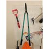 Image 3 : Contents of Peg Board - saw, snow blade, Bug & Fly Catcher, 50ft. Outdoor Ext. Cord, Sack, Broomhead