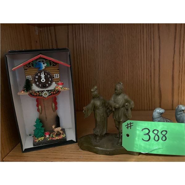 Approx. 8- Figurines & small coocoo clock