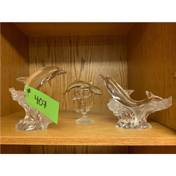 3- Glass dolphins’ figurines