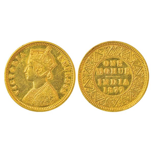 British India: Victoria Empress, gold mohur, 1877, Calcutta mint, two flowers in bottom panel and 'V