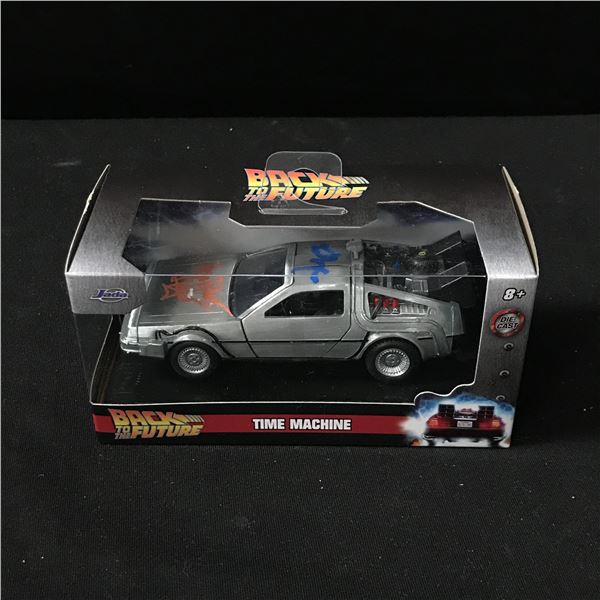 CHRISTOPHER LLOYD AND MICHAEL J FOX SIGNED DELOREAN - WWOC COA