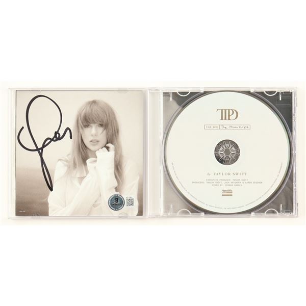 TAYLOR SWIFT SIGNED CD COVER AND CD BECKETT COA