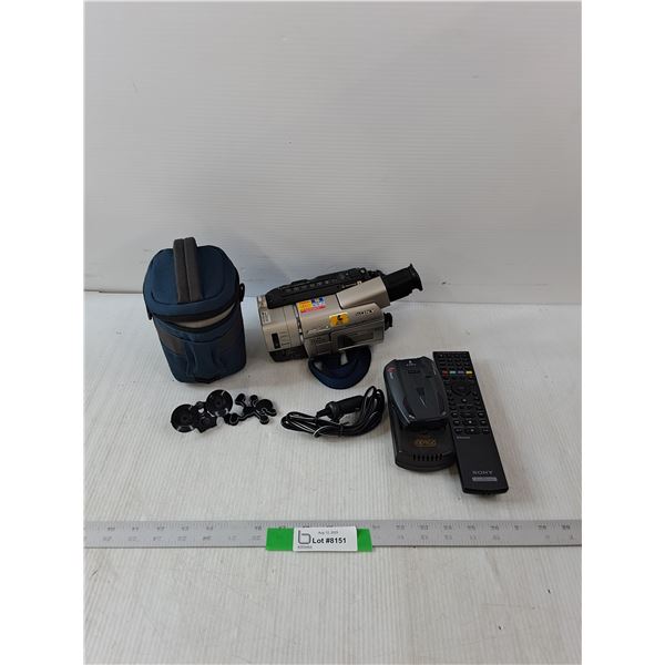 Sony Handy Cam Vision, Comcorder Li-ion Battery Charger, Playstation Remote- Camera Bag