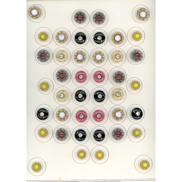A full card of OLD moonglow glass buttons
