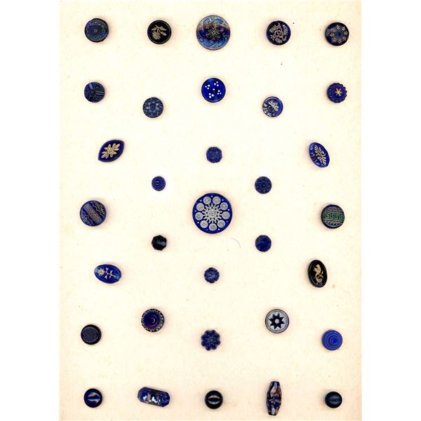 A full card of old cobalt glass buttons