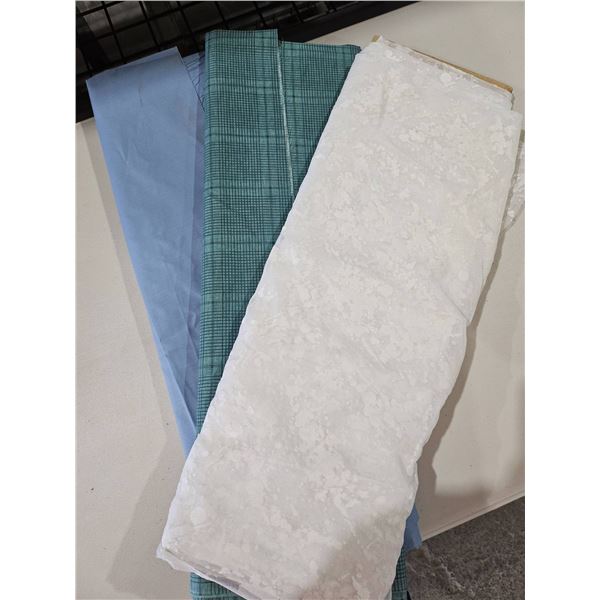 3 Rolls of Fabric, Various Styles and Colors