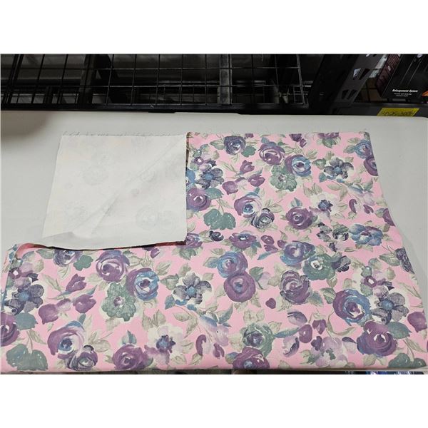 Floral Patterned Fabric Roll with Pink, Purple, and Green Design