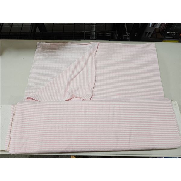 Pink and White Striped Fabric Roll in Folded State