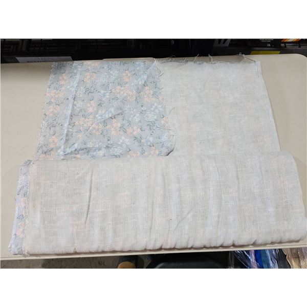Woven Fabric Roll with Light Blue and Pink Pattern Design