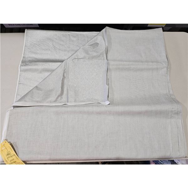 Silver Fabric Material Roll With Partial Label Description