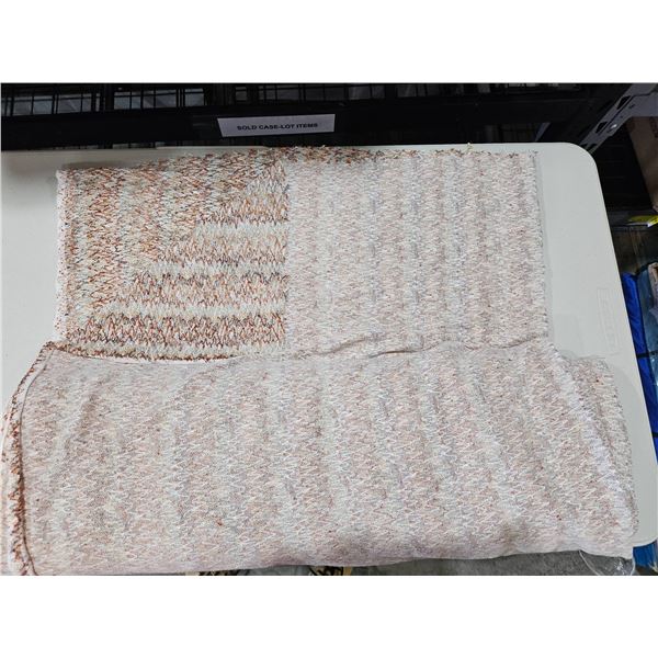 Roll of Textured Fabric Material with Neutral Tones