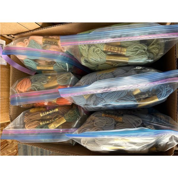Yarn Skeins in Various Colors and Bundles in Plastic Bags