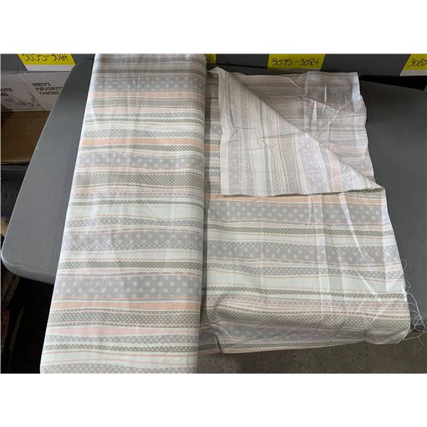 Roll of Decorative Fabric in Striped and Dotted Pattern