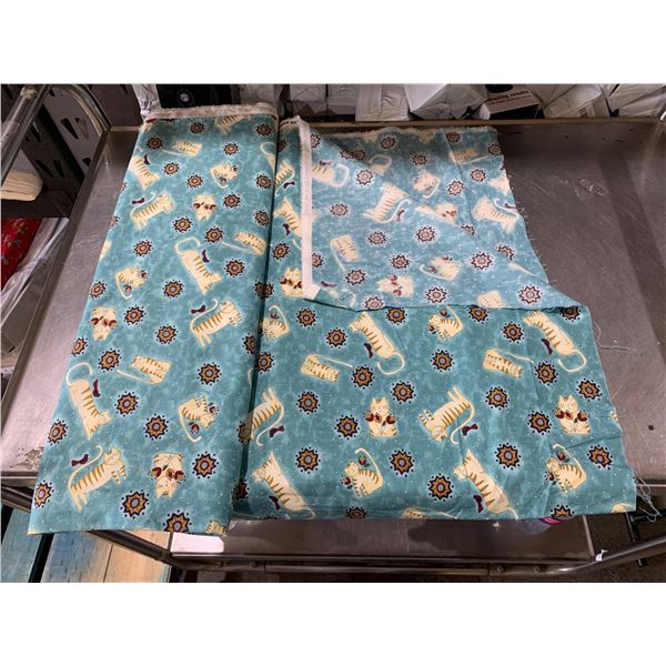 Blue Fabric With Animal Prints on Roll,