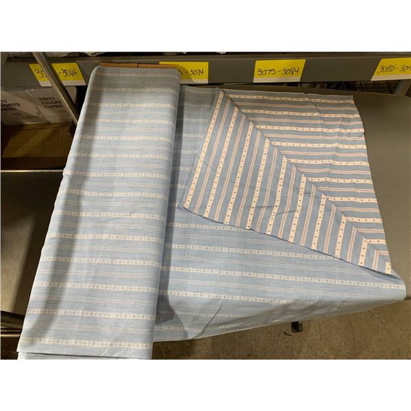 Roll of Striped Fabric in Blue and White with Pink Patterns
