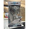 Image 2 : Waterpik ShowerClean Pro Handheld Showerhead with 7 Spray Settings