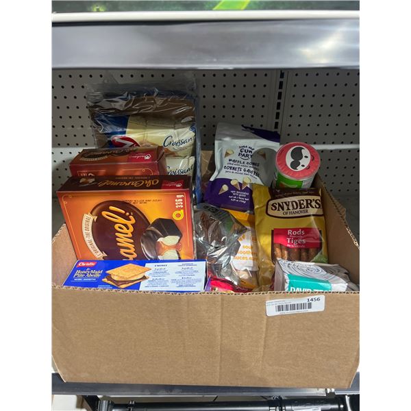 Lot of Assorted Food and Snack Items Including Chocolates, Cookies, and Pretzels