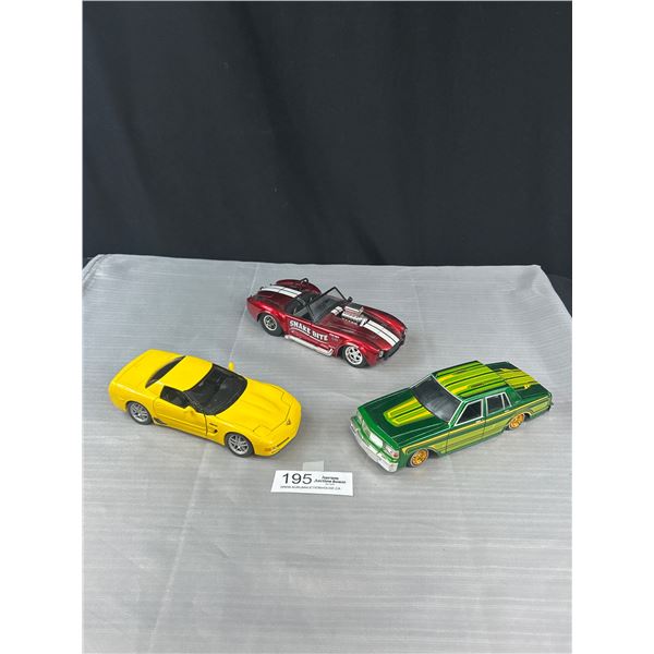 Lot of 3 1/24th Scale Diecast Cars