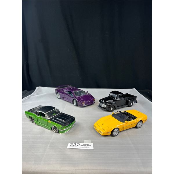 Lot of 4 1/24th Scale Diecast Cars