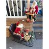 Image 1 : 2 Santa Clause's One On Sleigh One At Desk, 29" L 24" T NO SHIPPING